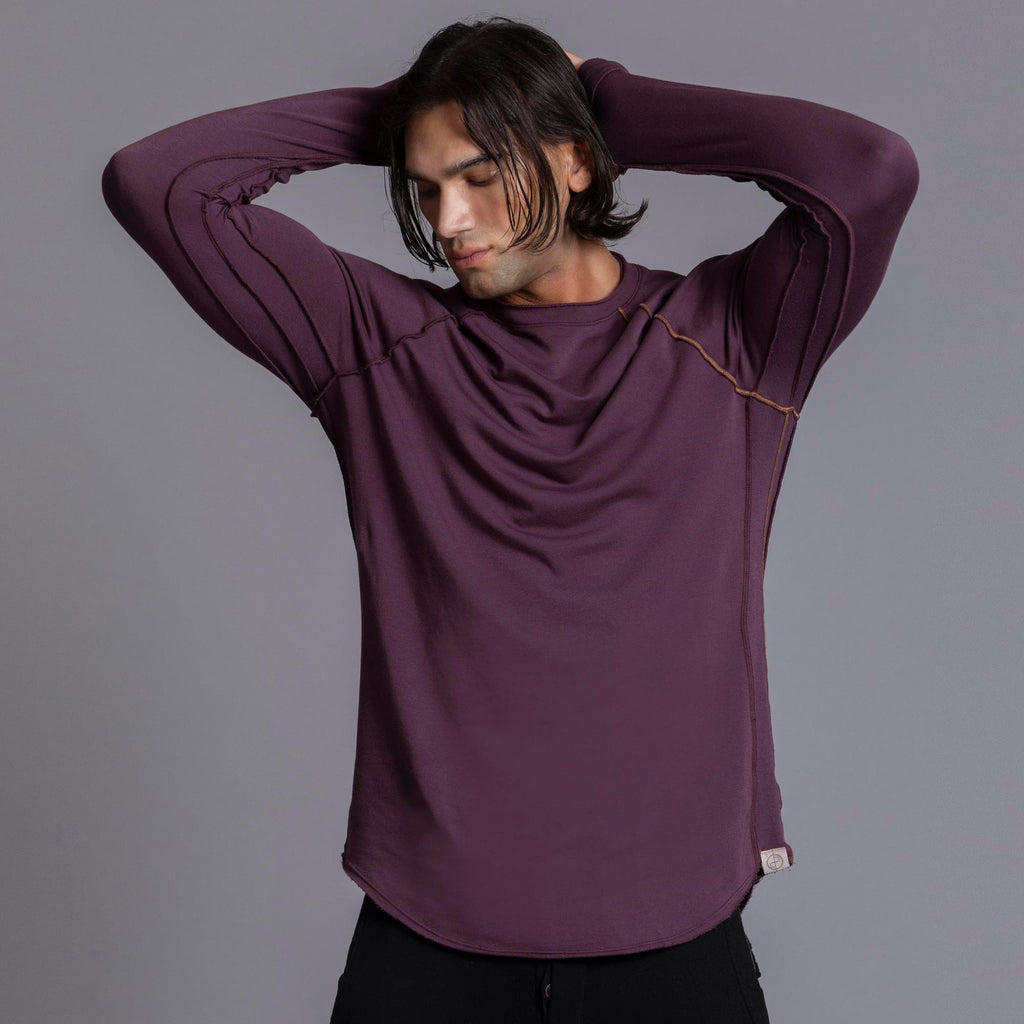 Male modeling purple long sleeve raglan