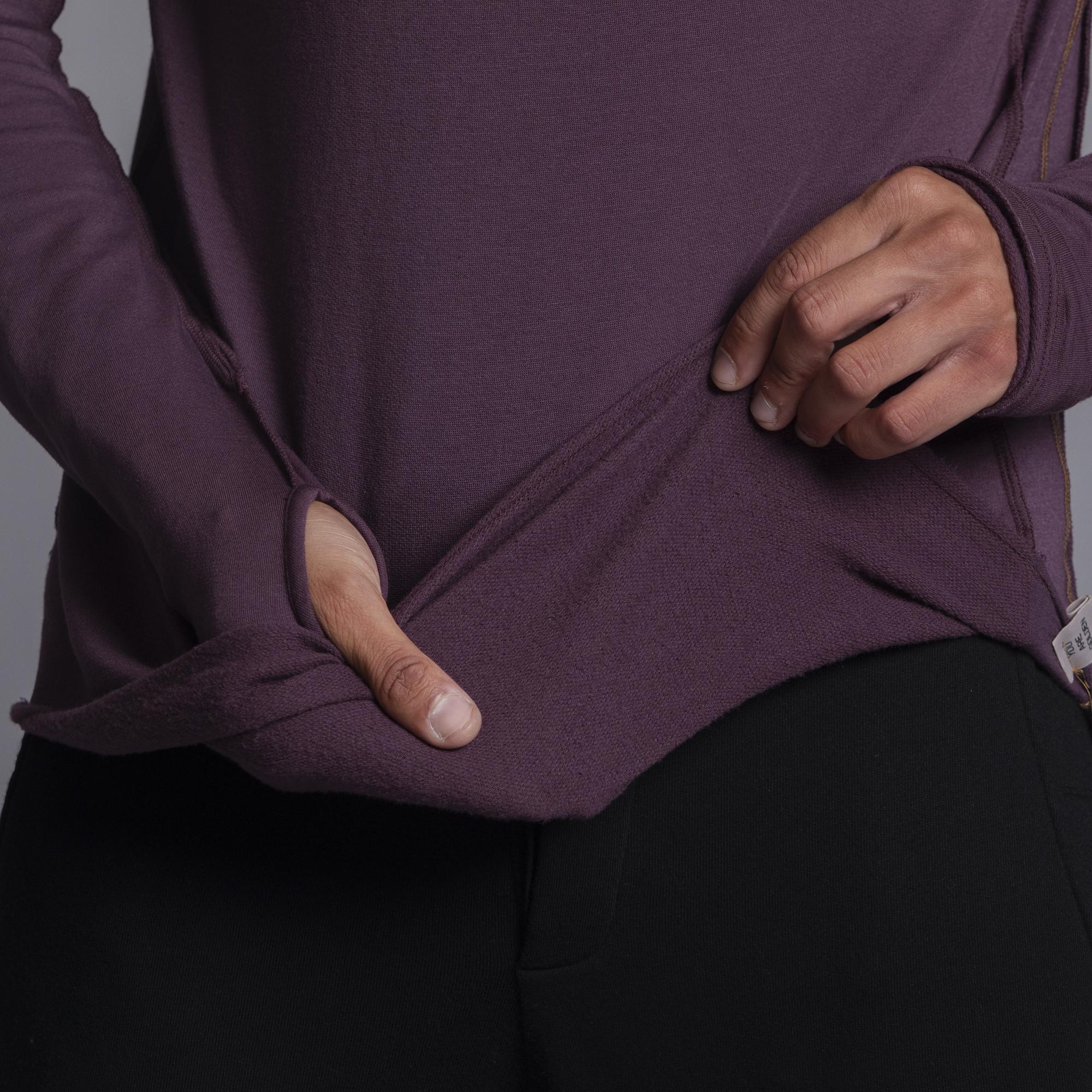 Male modeling purple long sleeve raglan