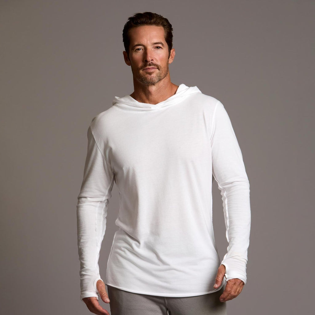 Man modeling white long-sleeve hooded tee