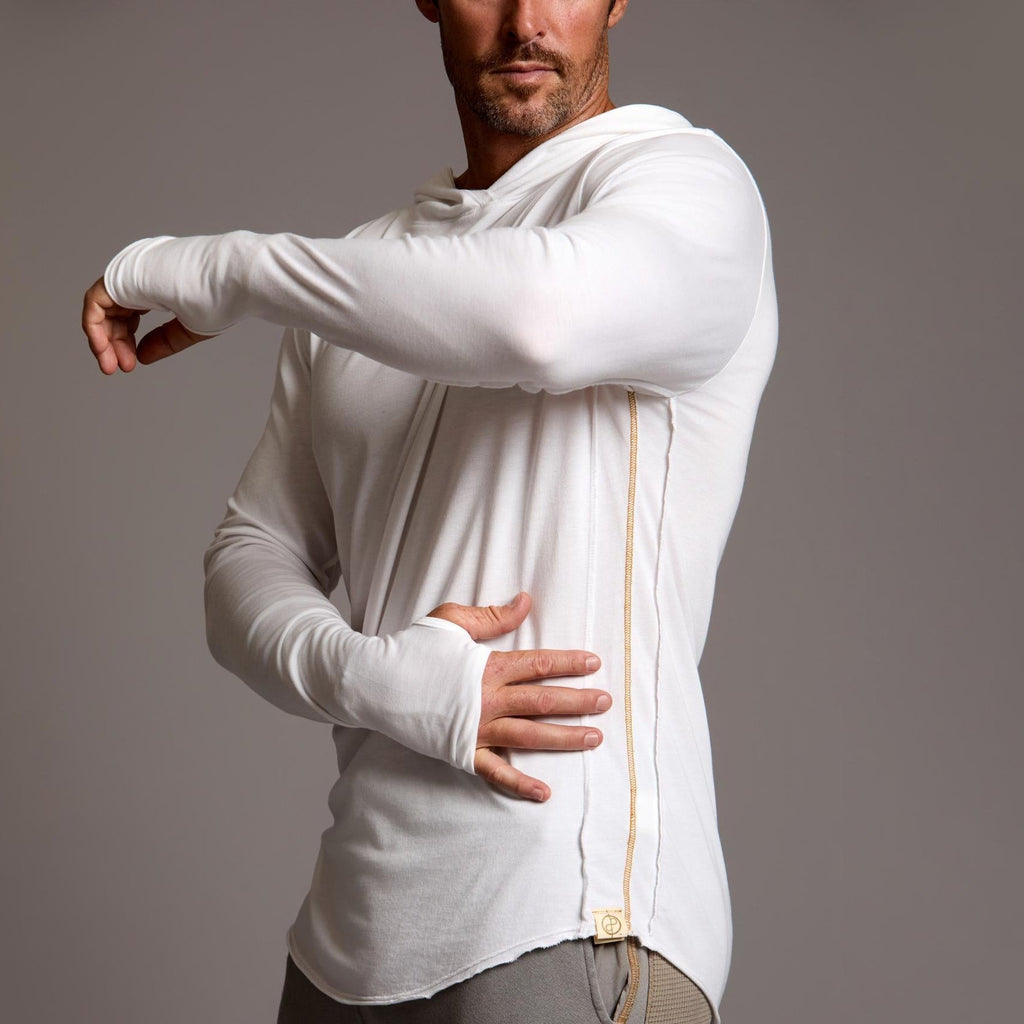 Man modeling white long-sleeve hooded tee