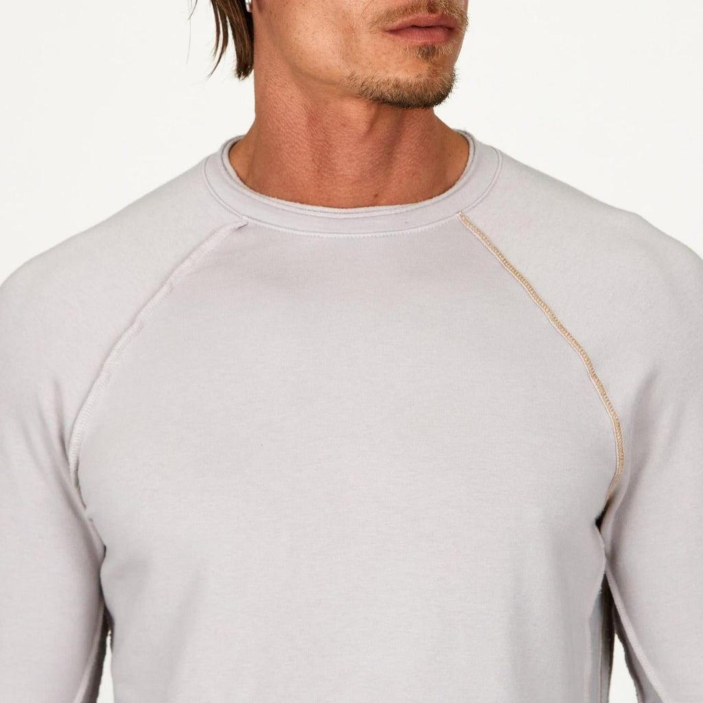 Male modeling silver long sleeve raglan
