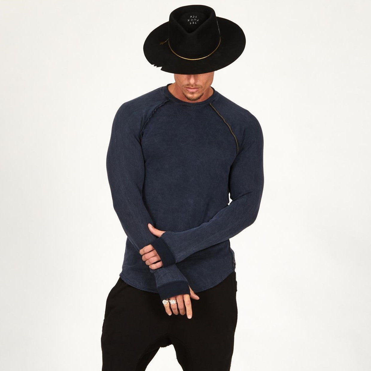 Male modeling dark blue long sleeve raglan