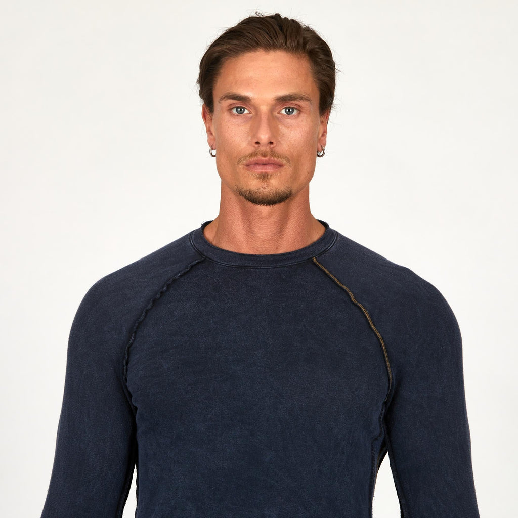 Male modeling dark blue long sleeve raglan