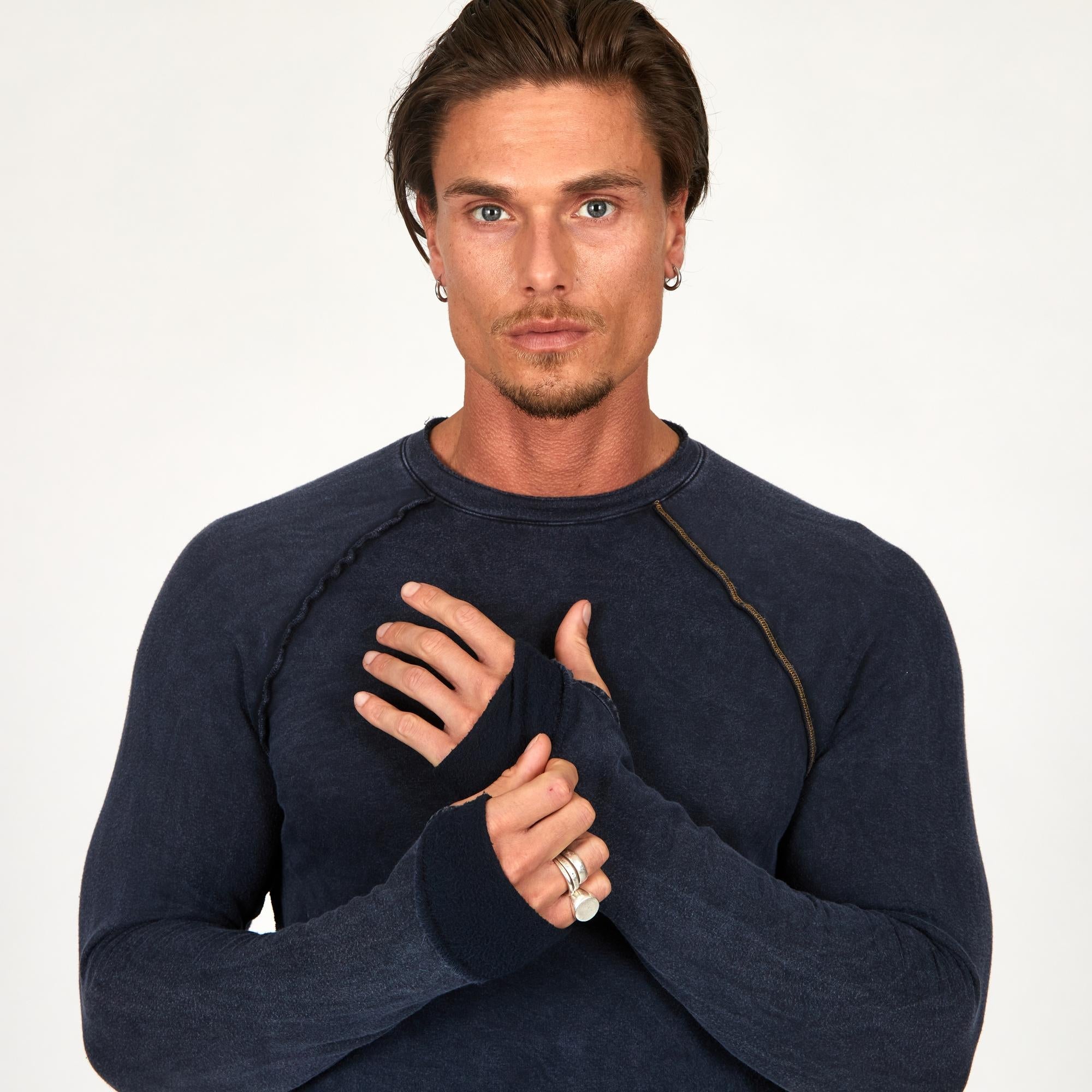 Male modeling dark blue long sleeve raglan
