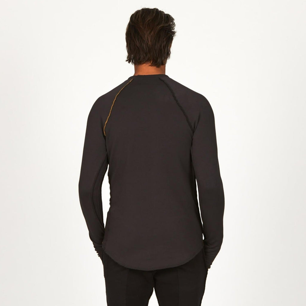 Male modeling dark long sleeve raglan