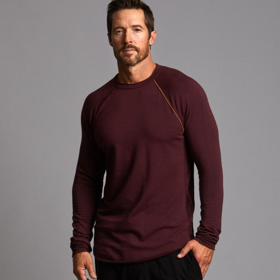 Male modeling red long sleeve raglan