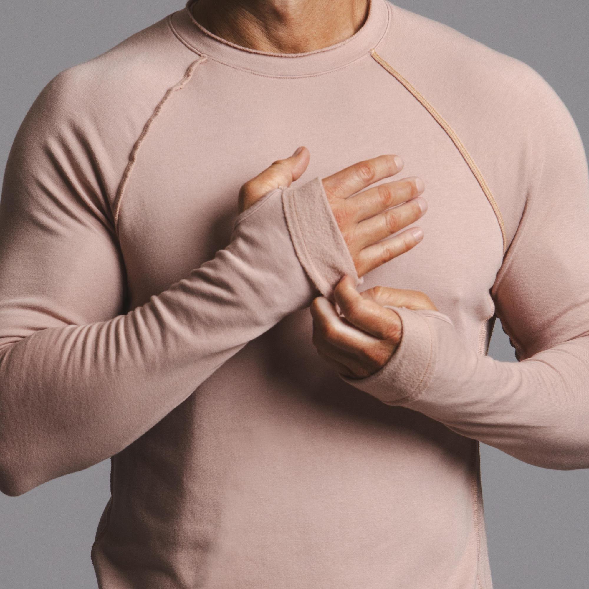 Male modeling pink long sleeve raglan