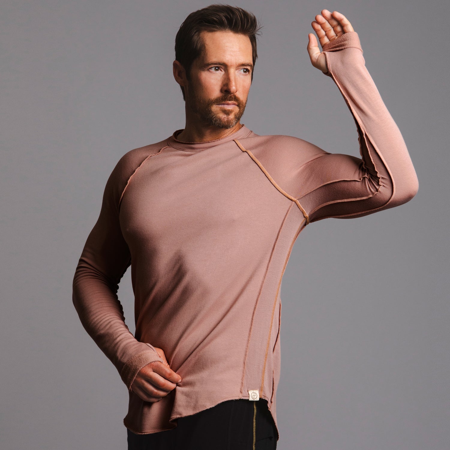 Male modeling terracotta long sleeve raglan