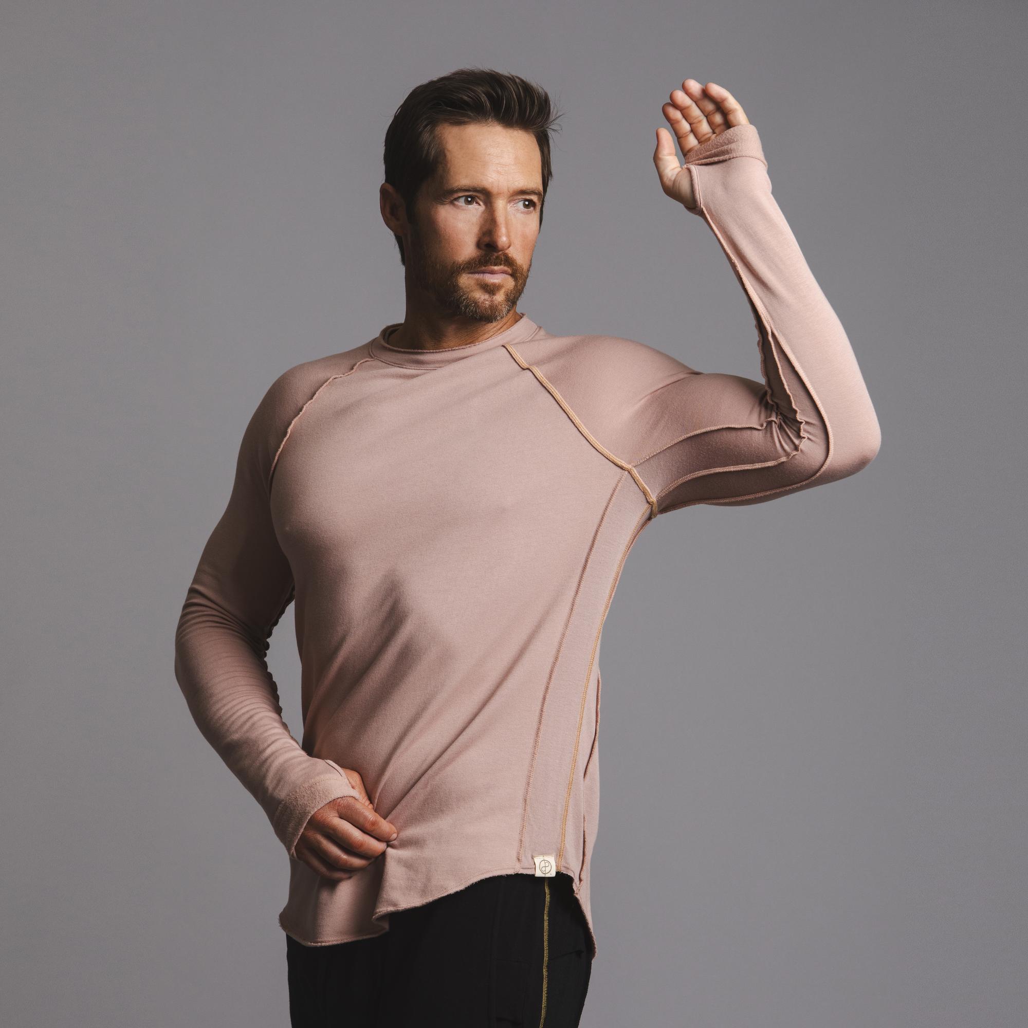 Male modeling pink long sleeve raglan