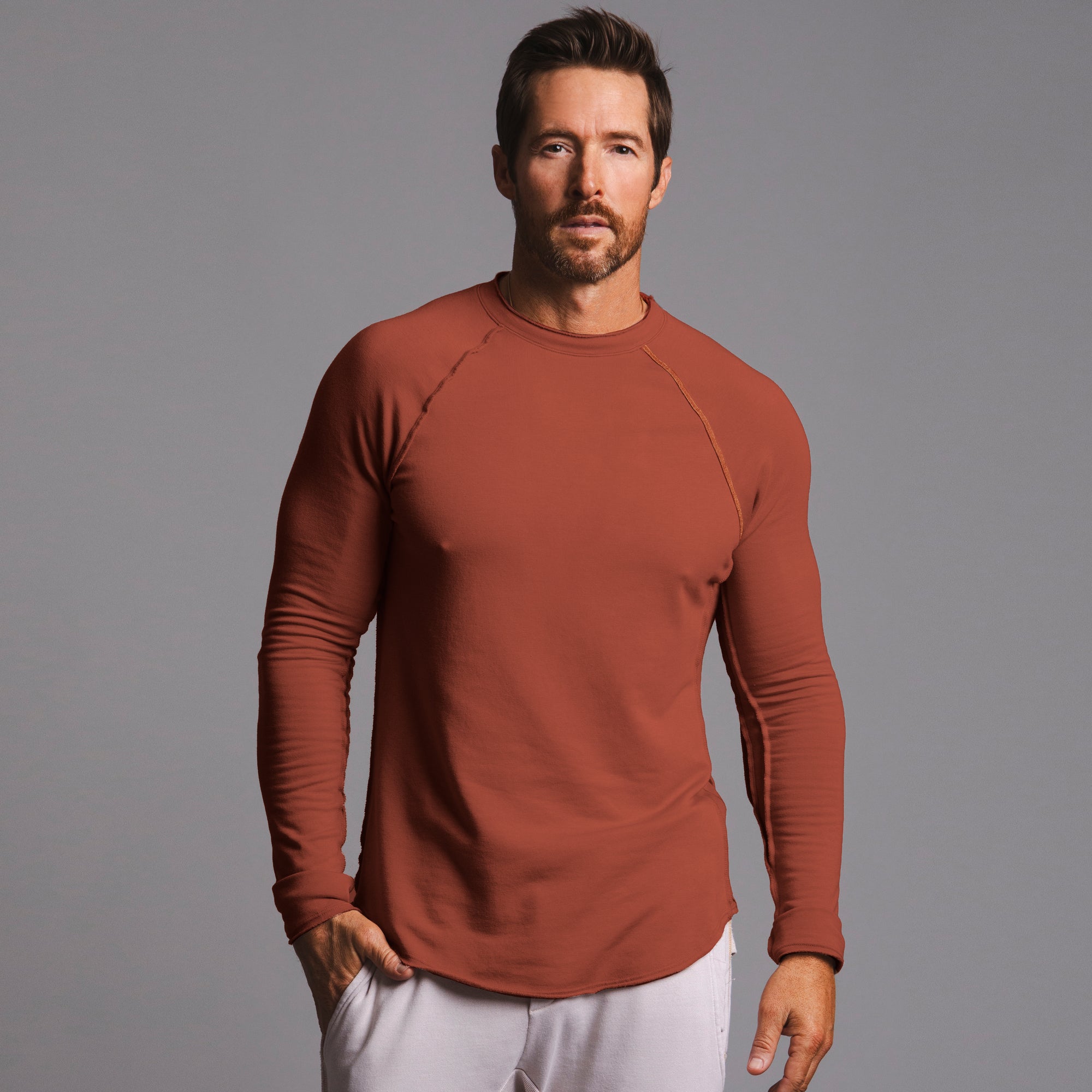 A man modeling kairos duster in sienna soul