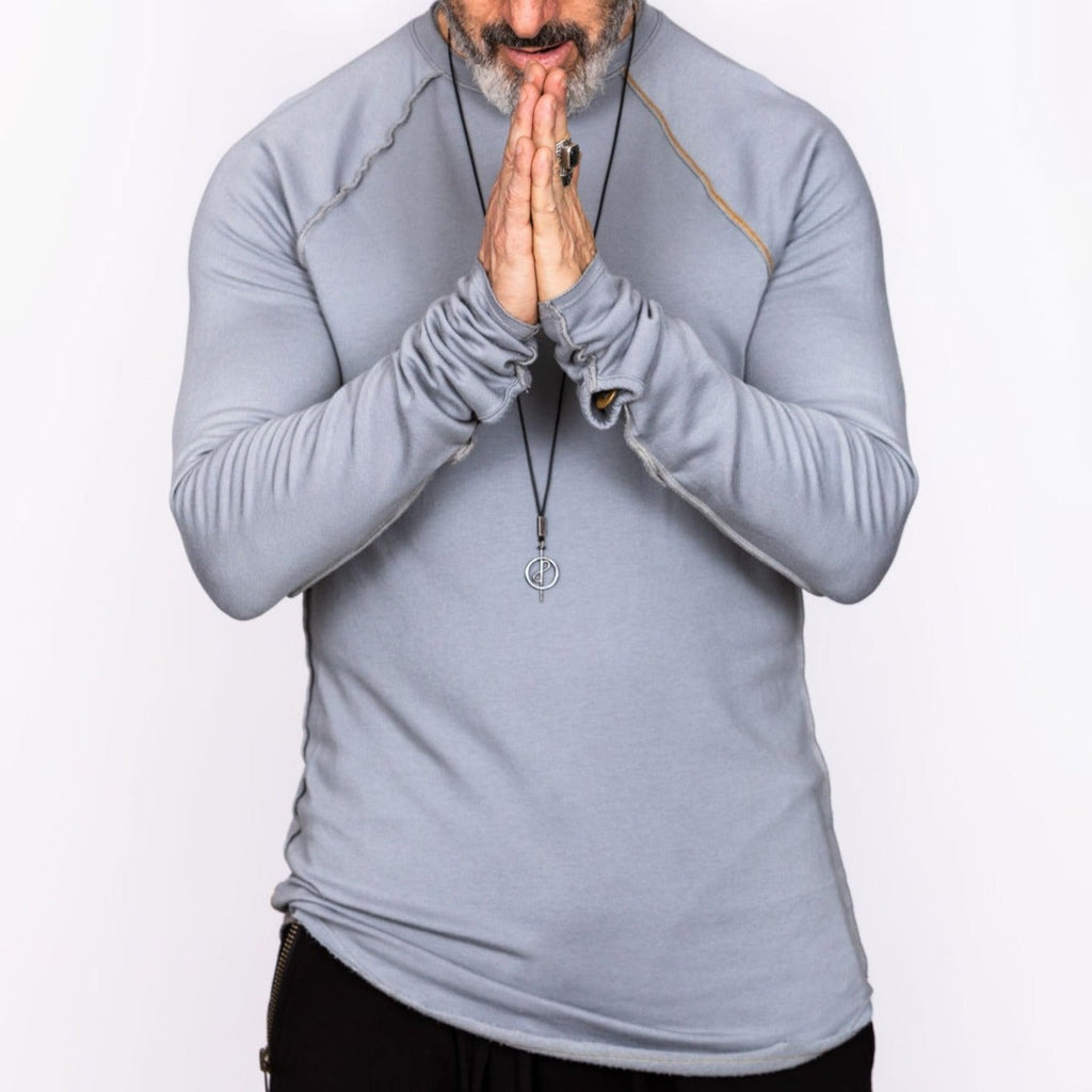 Male modeling light blue long sleeve raglan