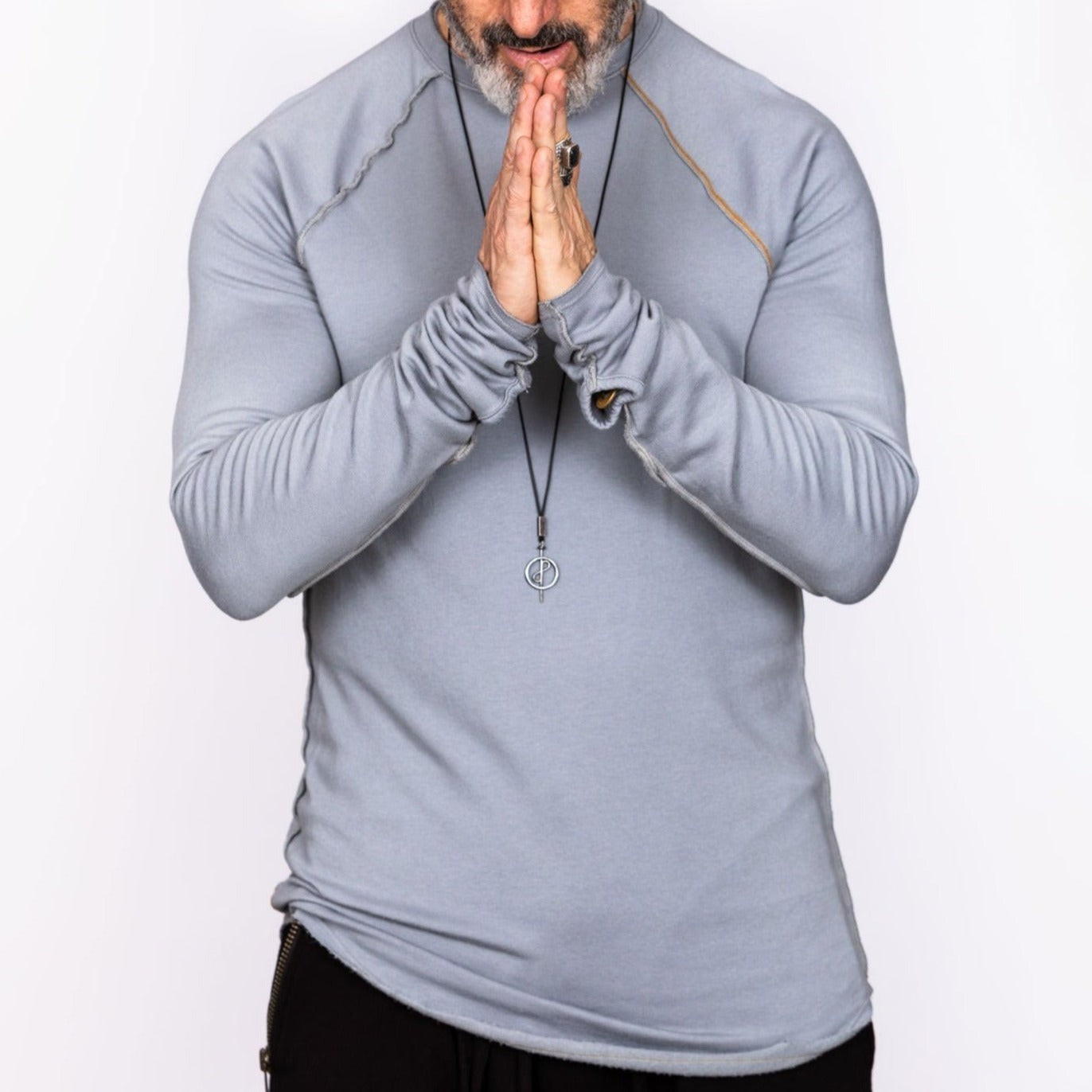 Male modeling light blue long sleeve raglan